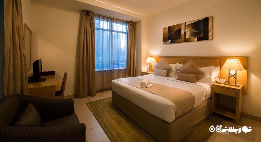 نمای تخت بزرگ آپارتمان یک خوابه دلوکس