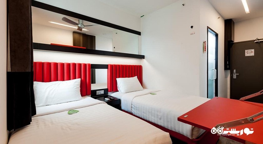 نمایی از تخت های اتاق توئین