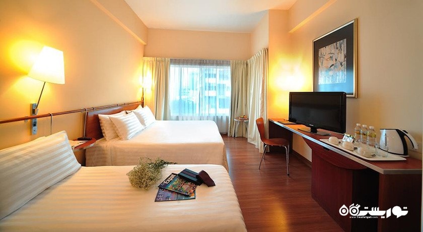 نمای تخت های اتاق دلوکس تریپل