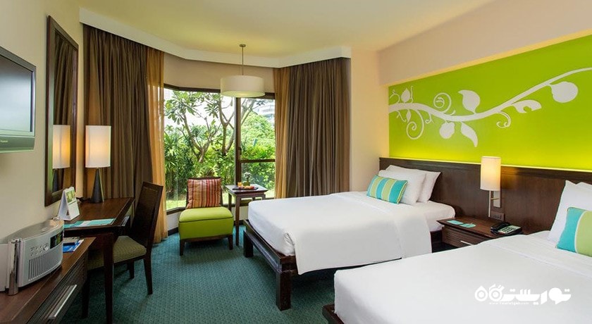 تخت های توئین اتاق دلوکس با چشم انداز باغ