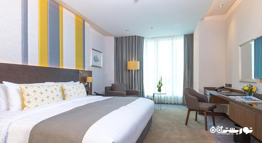 نمای تخت بزرگ اتاق دلوکس کلاب