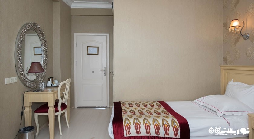 نمایی از تخت اتاق دبل