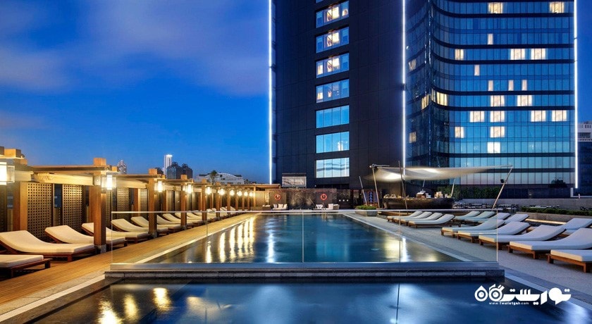 نمای استخر روباز و ساختمان هتل