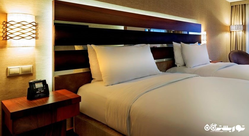 نمایی از تخت های اتاق توئین