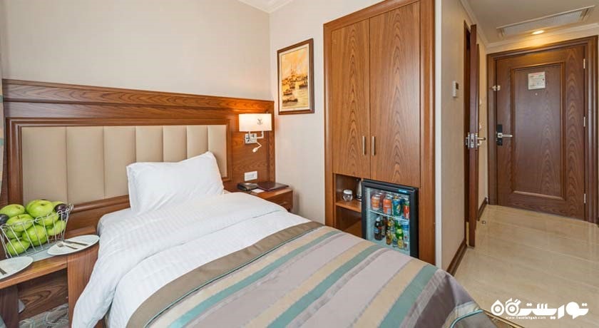 نمایی از تخت اتاق سینگل