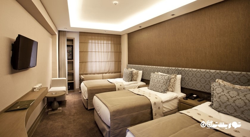 نمای تخت های اتاق تریپل