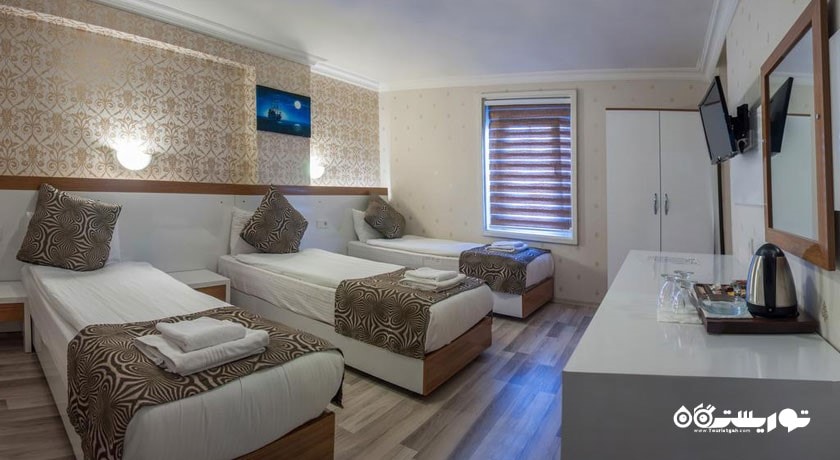 نمای تخت های اتاق تریپل