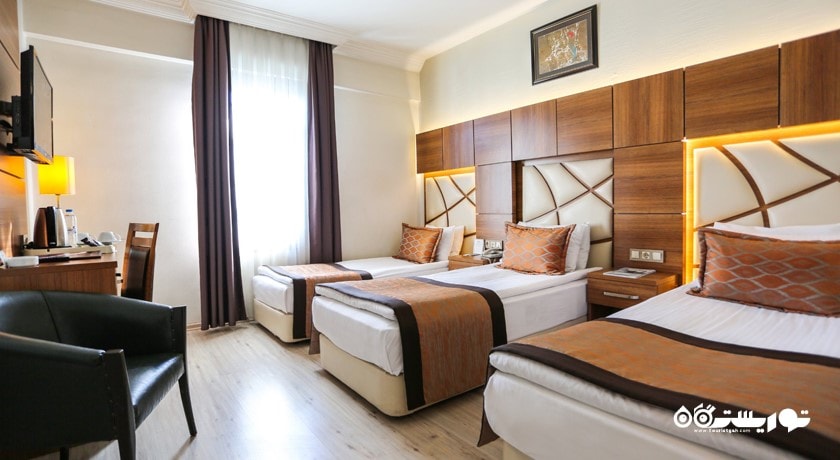 نمای تخت های اتاق تریپل