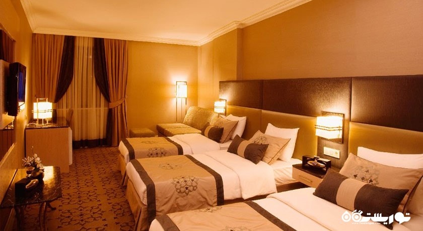 نمای تخت های اتاق تریپل