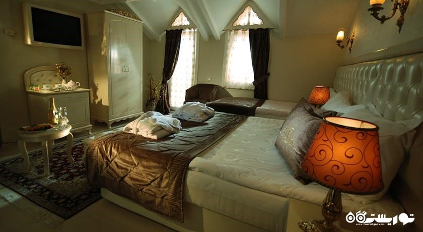 نمایی از اتاق تریپل هتل نینا	