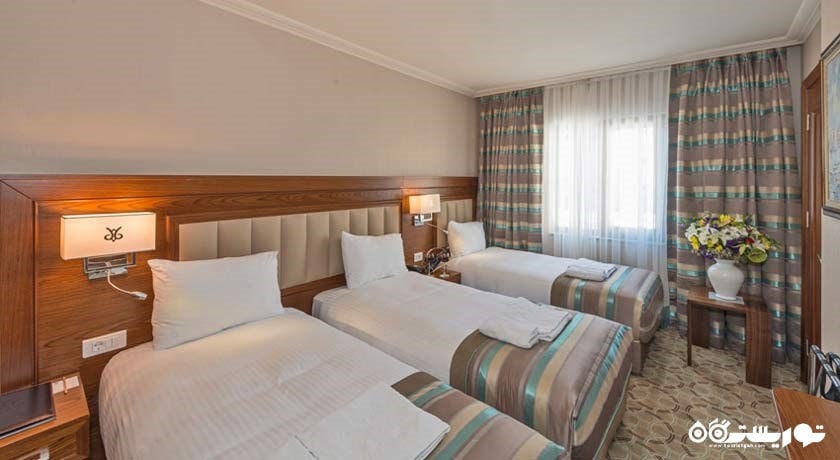 نمای تخت های اتاق تریپل	