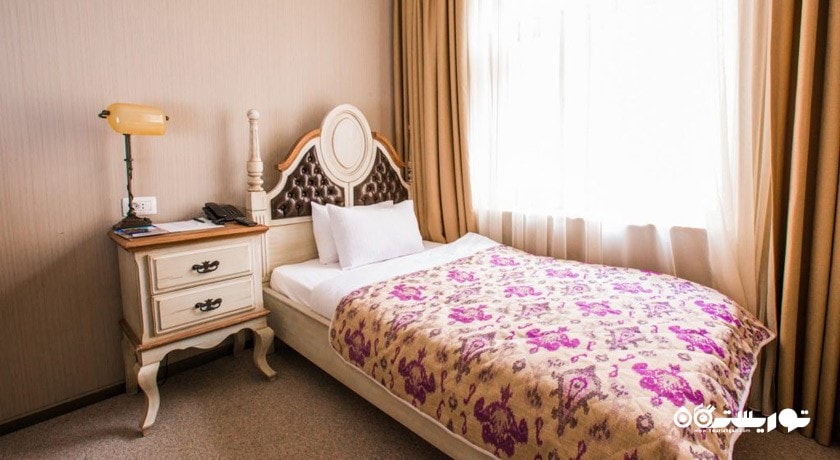 نمایی از تخت تکی اتاق سینگل