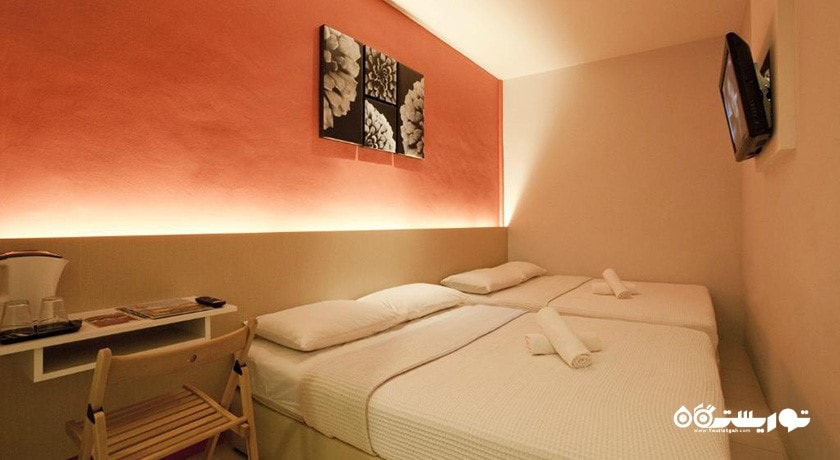 اتاق کوآدریپل هتل سیمز بوتیک