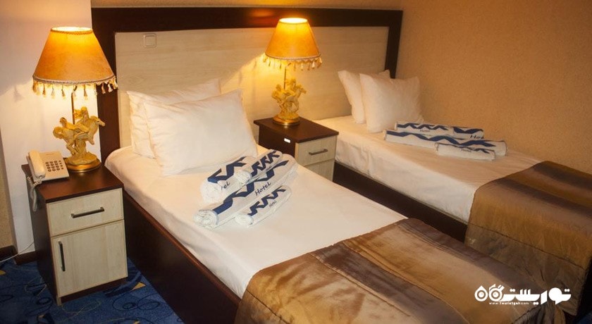 نمای تخت های اتاق توئین