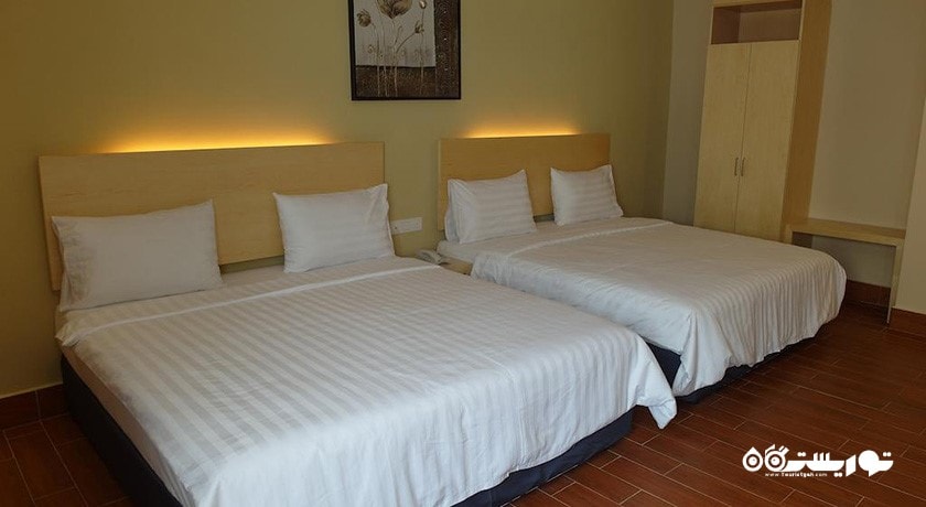 نمای تخت های اتاق کوادریپل