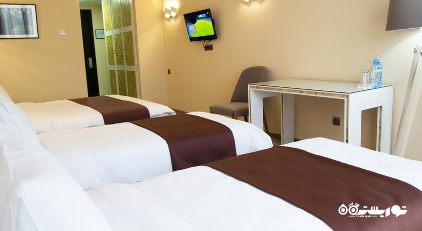 نمای تخت های اتاق تریپل