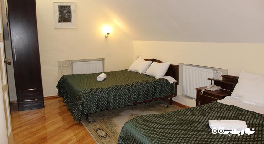 نمای تخت های اتاق کوادریپل