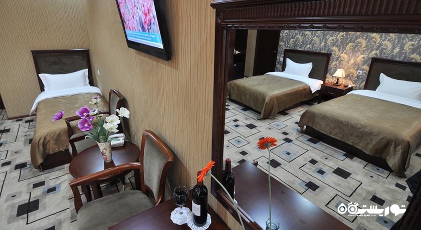 نمای تخت های اتاق کوادریپل