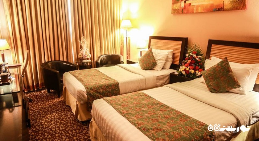 نمای تخت های اتاق توئین