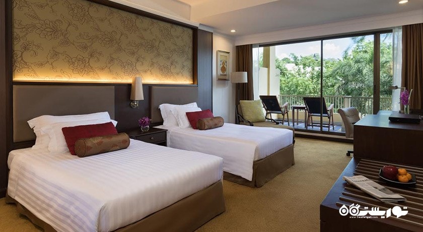 تخت های توئین اتاق پرمیوم با چشم انداز باغ
